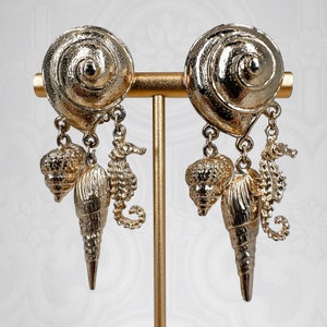 Orecchini vintage con conchiglia color oro: pendenti con clip Avant Garde