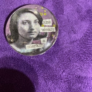 Funny magnet: She wears a merkin; pubic wig, inappropriate humor, one of a kind gift, humorous saying, individually hand made, comical, fun