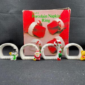 Vintage porcelain Christmas napkin rings, candy cane, snowman, bear and Santa