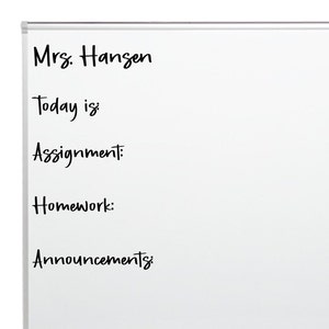 May include: Whiteboard with the text "Mrs. Hansen" at the top, followed by "Today is:", "Assignment:", "Homework:", and "Announcements:".