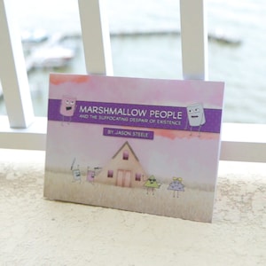 May include: A book titled "Marshmallow People and the Suffocating Despair of Existence" by Jason Steele. The cover features a purple and pink background with a house and cartoon characters.
