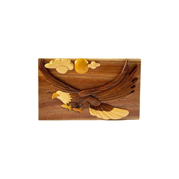 Soaring Eagle - Carver Dan’s hand-carved wooden puzzle box with hidden black felt interior compartment.