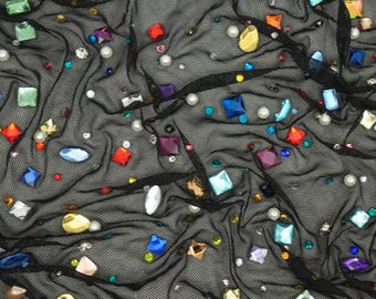 Zwarte gaaskralen en strass polyester spandex stof bijna 2 yards