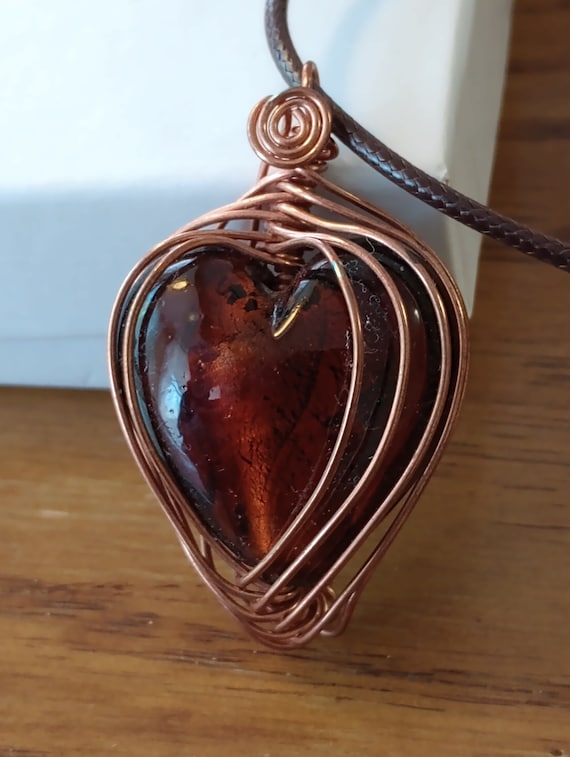 Wrapped Around the Heart. Copper wrapped Brown Blown Glass Heart