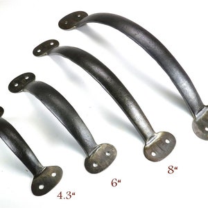 May include: Four black metal door handles of different sizes. The handles are 4.3 inches, 6 inches, 8 inches, and 9.45 inches long.