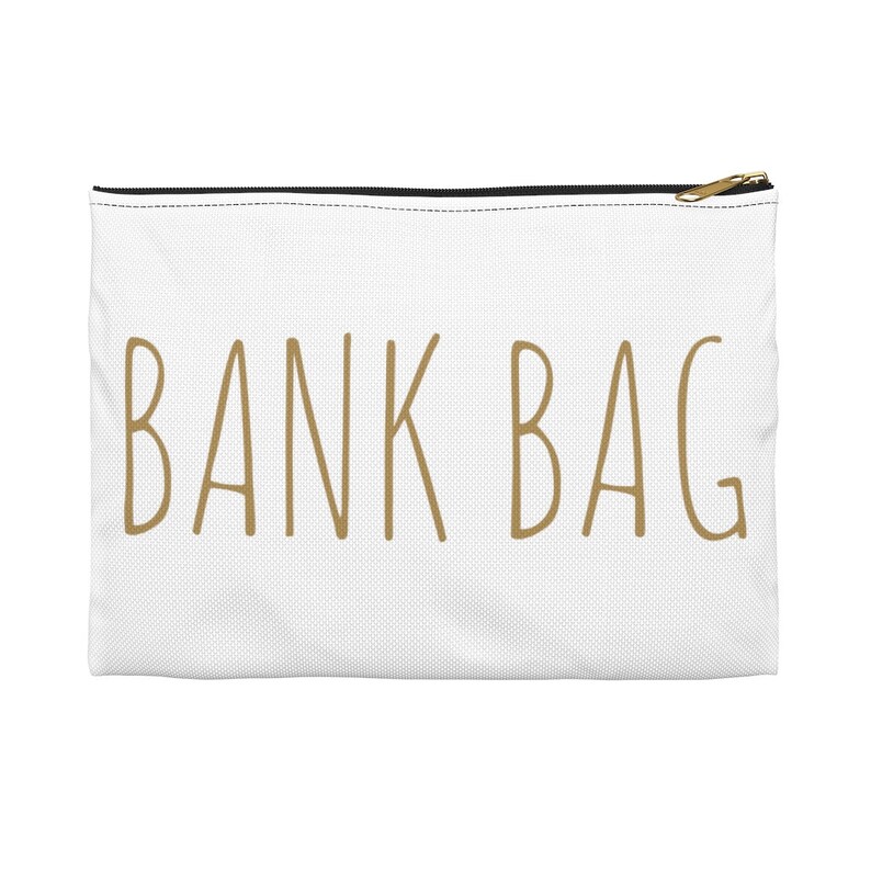 May include: White zippered pouch with the text "BANK BAG" in gold lettering.