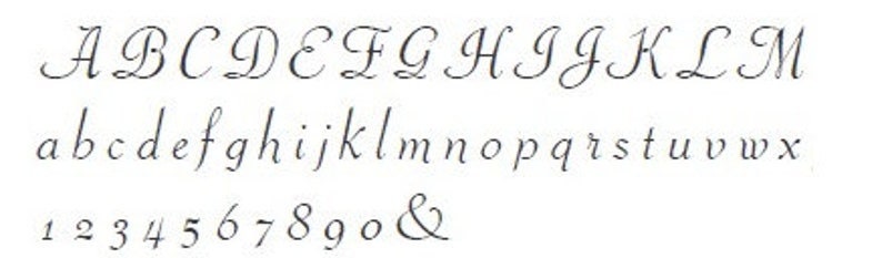 May include: A font alphabet chart with uppercase and lowercase letters, numbers, and the ampersand symbol. The font is a cursive script style.