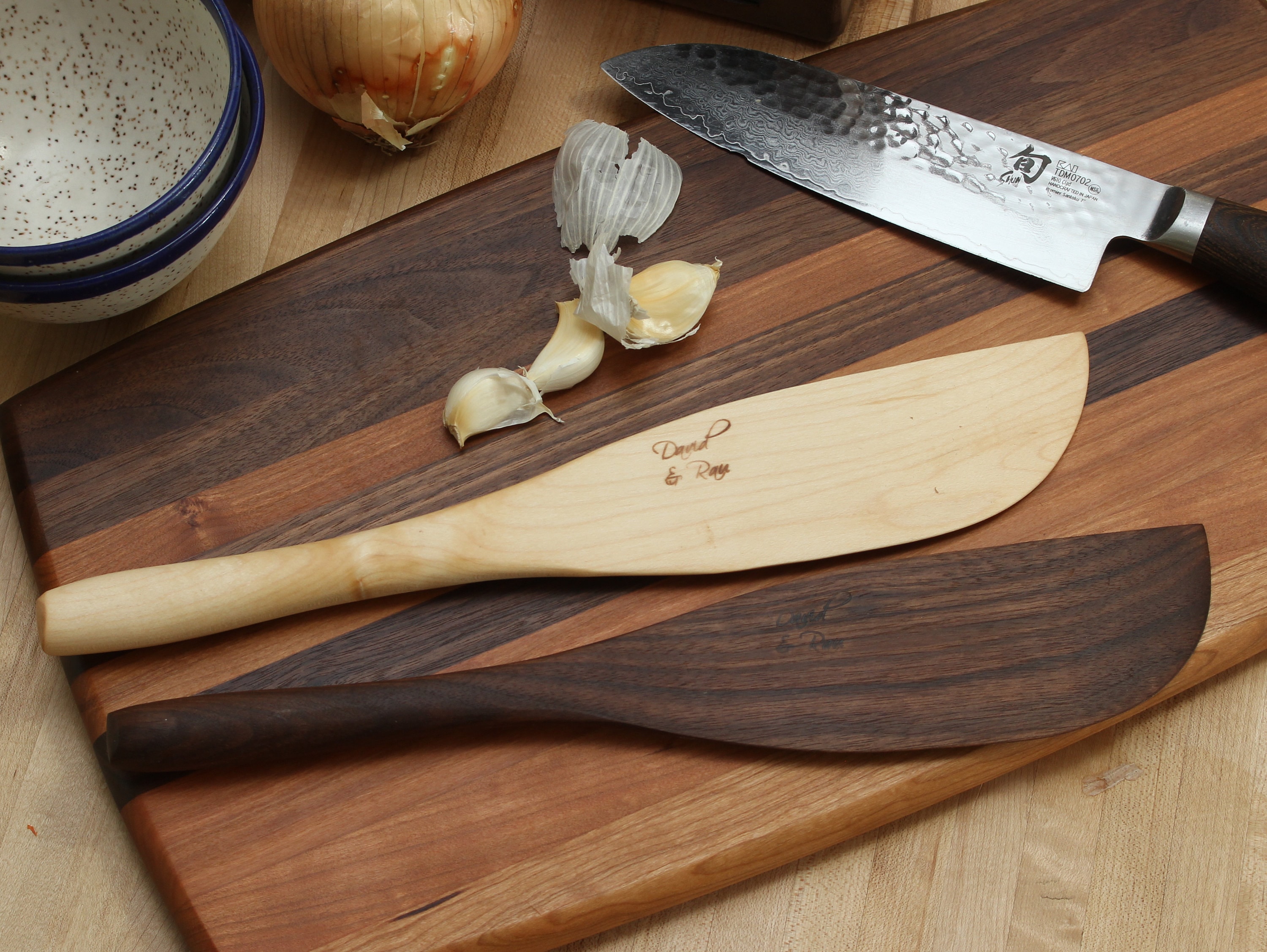 Handmade wooden kitchen spatulas from maple, cherry and walnut. domestic hardwood from Canada, oil and wax finish
