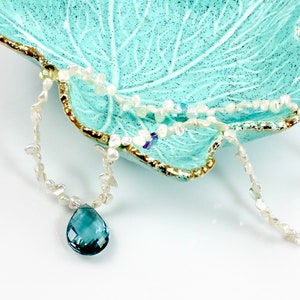 Freshwater pearl necklace with large blue topaz quartz pendant
