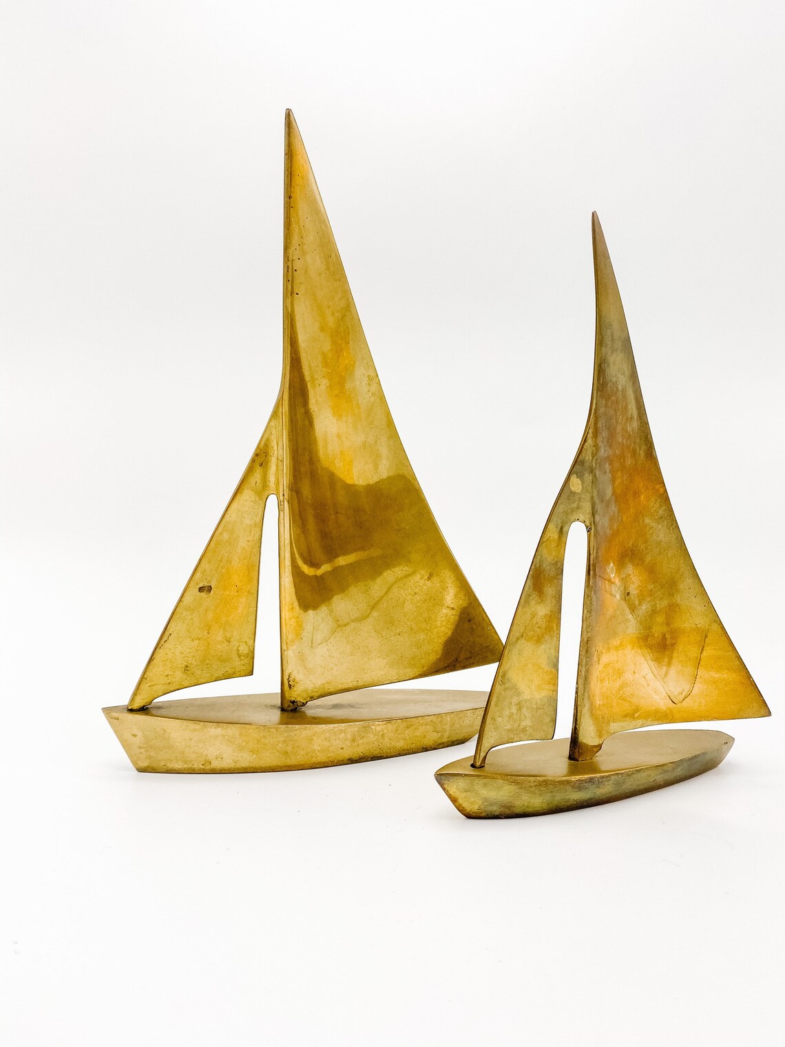 vintage brass sailboats