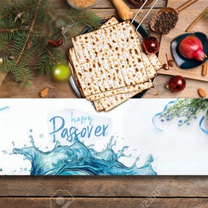 May include: A wooden table setting with a banner that reads "Happy Passover". The table is decorated with matzah, a pomegranate, and sprigs of greenery.