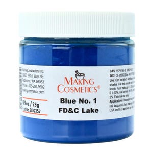 May include: A jar of blue FD&C Lake powder from Making Cosmetics. The jar has a white lid and a label with product information, including the text "Blue No. 1" and "0.9oz / 25g".