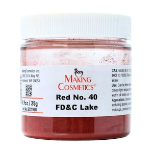 May include: A clear jar with a white lid contains red FD&C Lake powder. The label reads "Making Cosmetics" and "Red No. 40." The jar contains 0.9oz / 25g of product. The product is for use in cosmetics.