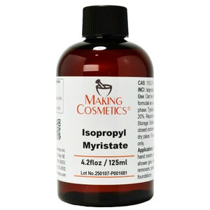 May include: A brown glass bottle with a black cap, labeled "Isopropyl Myristate" from Making Cosmetics. The label also indicates a volume of 4.2 fl oz / 125ml. The bottle contains a clear liquid and is designed for cosmetic applications.