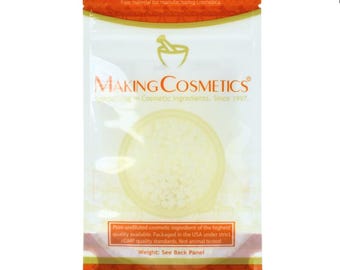 May include: A clear plastic pouch with an orange top and bottom, containing small, off-white beads. The pouch features the "MAKING COSMETICS" logo and text indicating it's a cosmetic ingredient. The text also states the product is packaged in the USA.