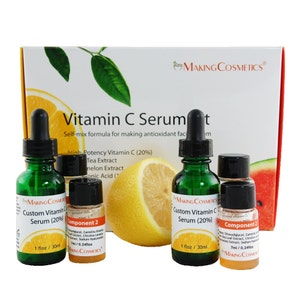 May include: A set of three glass bottles with green caps and labels that say "Making Cosmetics" and "Custom Vitamin C Serum (20%)". The bottles are on a white background with a box behind them that says "Vitamin C Serumet" and "Self-mix formula for making antioxidant facial serum".