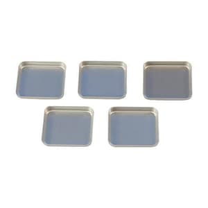 May include: Five silver square metal trays, each with a smooth, reflective surface. The trays are arranged in a staggered pattern.