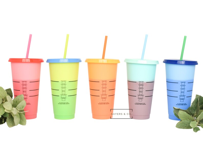 Paper Cups with Lids and Straws Top view. Plastic Straw Cup Fruit Lemonade. Cold cups