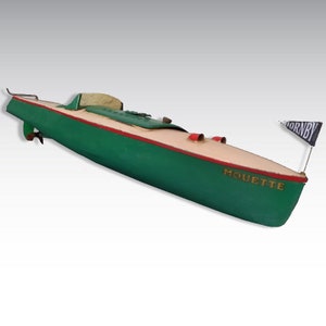 Old mechanical toy Hornby seagull canoe