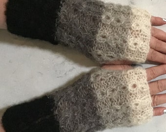 Avec de la soie d’alpaga tricotée, des gants sans doigts doux et chauds avec un motif fantaisie élégant.