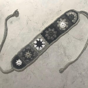 Crochet headband with granny squares in black, white and grey
