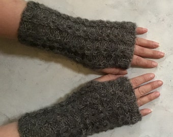 With alpaca silk knitted soft and warm fingerless gloves in a beautiful pattern