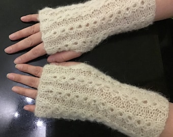 With brushed alpaca silk knitted warm and soft fingerless gloves with a beautiful pattern.