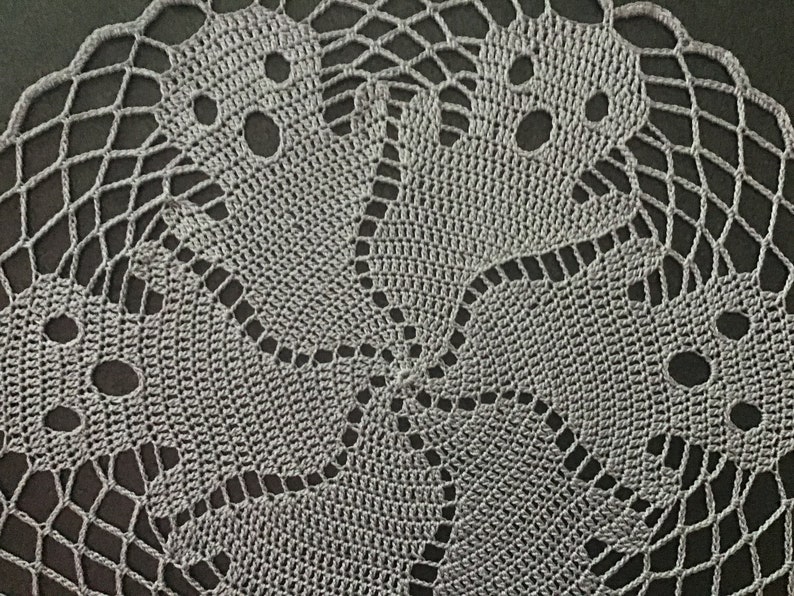 Crochet doily with ghosts image 3