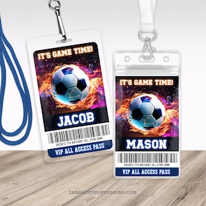 May include: Two clear plastic VIP All Access Pass cards with blue lanyards. Each card features a soccer ball engulfed in flames, the text "IT'S GAME TIME!", a name, and a barcode. One card says "JACOB" and the other says "MASON".