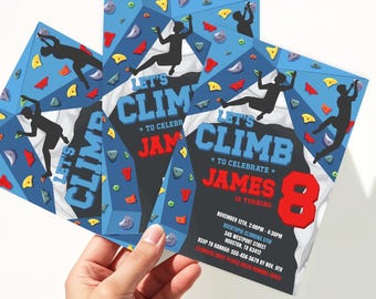 May include: A stack of blue, white, and red birthday party invitations with a climbing theme. The invitations feature the text "Let's Climb" and "James is turning 8". The background has climbing holds and silhouettes of climbers.