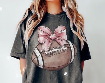 Comfort Colors® Pink Coquette Football Shirt, Football Mom Shirt, Sports Mom Gift, Gameday Shirt, Football Gift Shirt, Football Bow Tee