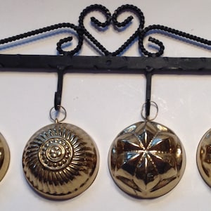 Mini Brass Gelatin Molds with Black Wrought Iron Display Rack