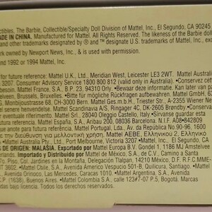 May include: A close-up of a product label with text from Mattel, Inc. The label includes copyright information, manufacturing details, and addresses for future reference. The text is in English and other languages.