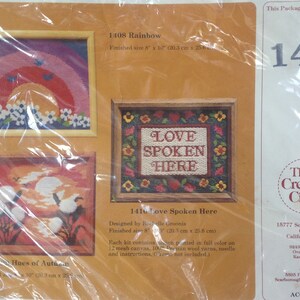 May include: A craft kit for needlepoint embroidery with three different designs. The designs are "Rainbow", "Love Spoken Here", and "Hues of Autumn". The kit includes 100% Persian wool yarn, a needle, and instructions. The finished size of each design is 8 inches by 10 inches.