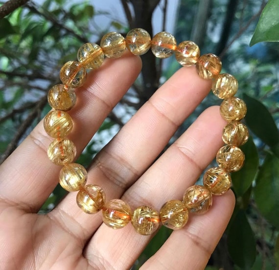 High Quality Natural Golden Rutilated Quartz Bracelet 16.7g 7.7mm/head 26  beads | Huangs Jadeite and Jewelry Pte Ltd