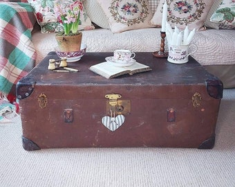 Handsome antique steamer trunk, coffee table, with monogram, inner tray and makers label