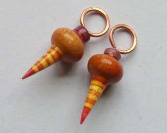 A pair of Small, Chunky, Stripe Painted, Rustic, Primitive, Turned look, Spike bead charms in Pink, brown, yellow and purple
