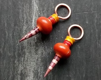 A pair of Small, Chunky, Stripe Painted, Rustic, Primitive, Turned look, Spike bead charms in Brown, purple, yellow and pink