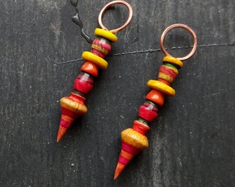 A pair of Stripe Painted, Turned look, Faux ceramic, Rustic, Tribal style Spikes in Yellow, red, pink and orange