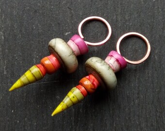 A pair of Stripe Painted, Turned look, Faux ceramic, Rustic, Tribal style Spikes in Grey, yellow, purple and pink