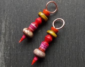 A pair of Stripe Painted, Turned look, Faux ceramic, Rustic, Tribal style Spikes in Red, green, pink and grey