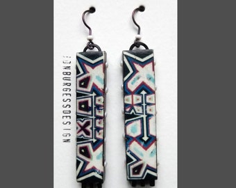 A pair of Long, Polymer clay and glass bead, Image transfer, Geometric pattern, Rectangular Earrings in Black, purple, blue and white