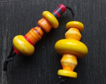 A pair of Large, Stripe Painted, Rustic, Primitive, Turned look, Chunky Spindle tube beads in Yellow, orange, purple and red