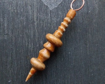 A Single, Turned look, Rounded, distress painted Spike Charm in Brown and grey