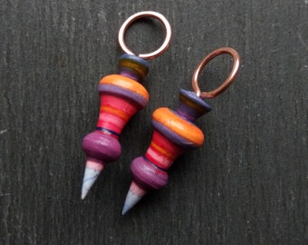 A pair of Stripe Painted, Turned look, Faux ceramic, Rustic, Tribal style Spikes in Pink, purple, orange and blue