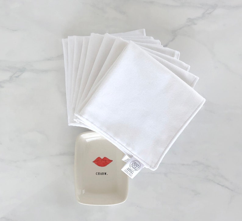 Fairface Washcloths made with soft white flannel, gentle for rosacea and sensitive skin displayed with cute charm soap dish