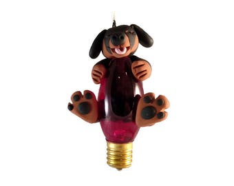 Rottweiler Hugging Christmas Bulb