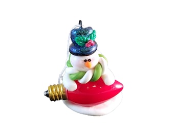 Snowman with his Light Bulb Ornament