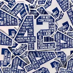 May include: A close-up of several blue and white stickers with the text "I'm not concerned with your liking or disliking me. All I ask is that you respect me as a human being." and "A life is not important except in the impact it has on other lives."