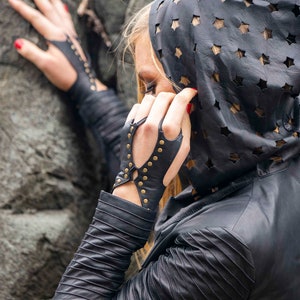 Black fingerless leather gloves by Love Khaos